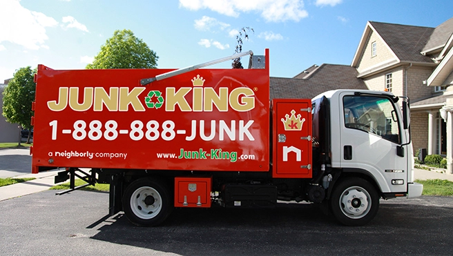 Red Junk King dump truck.