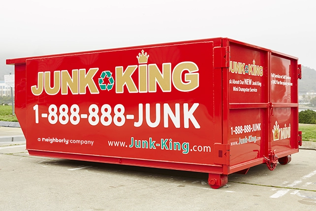 Red Junk King dumpster.
