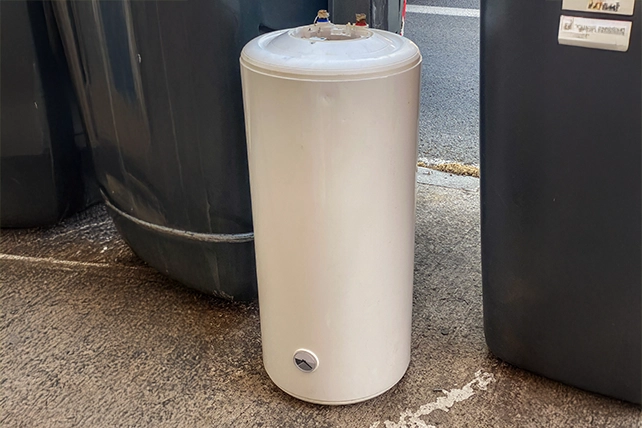 A small white water heater.