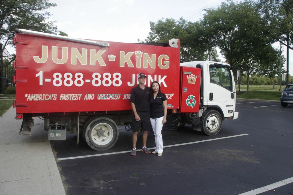 Junk King Franchise Owners,  Erik and Marta Hughes.