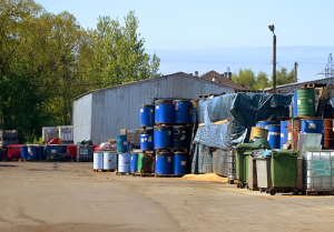 Chemical Waste in barrels outside building