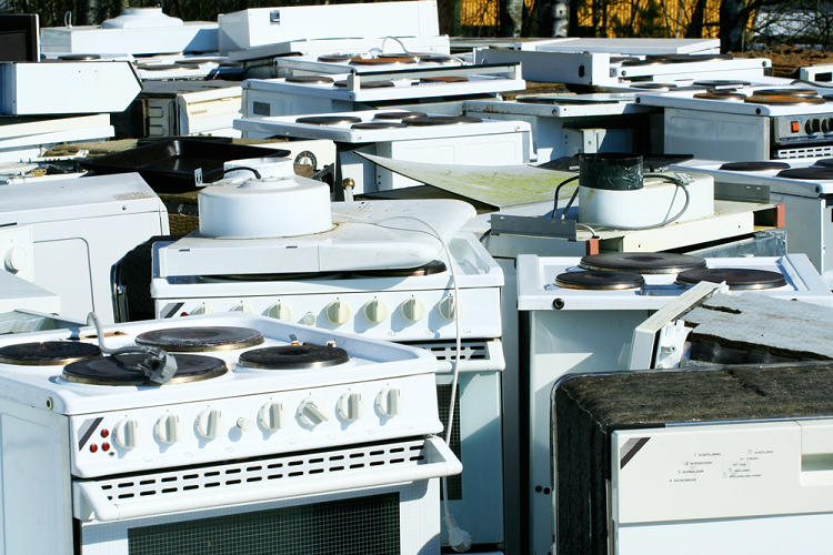 Pile of white old stoves