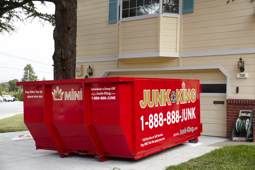 Suburban driveway dumpster showing price per project example