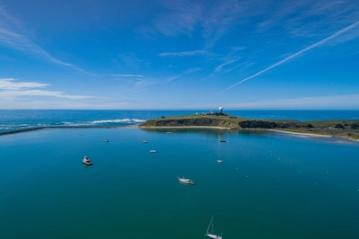 Aerial view of El Granada harbor coastline and skyline