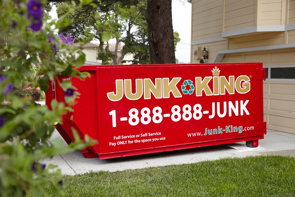 Junk King dumpster rental placed at a Half Moon Bay home for a cleanout project