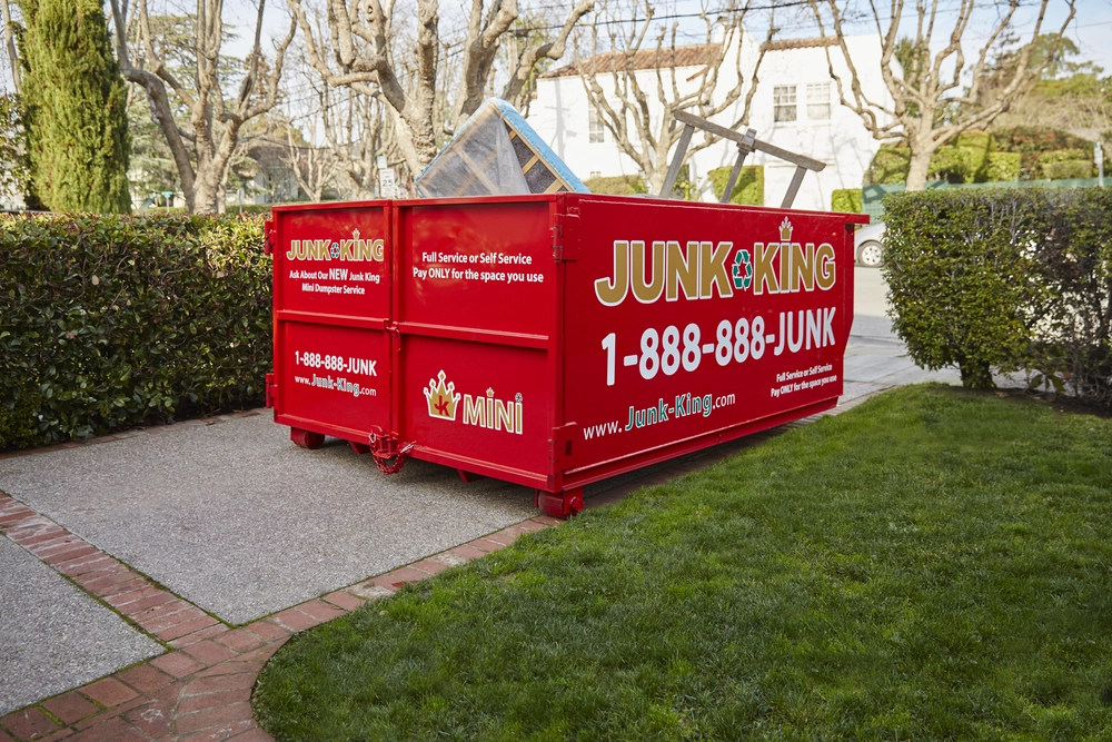 Junk King dumpster rental in Westborough driveway