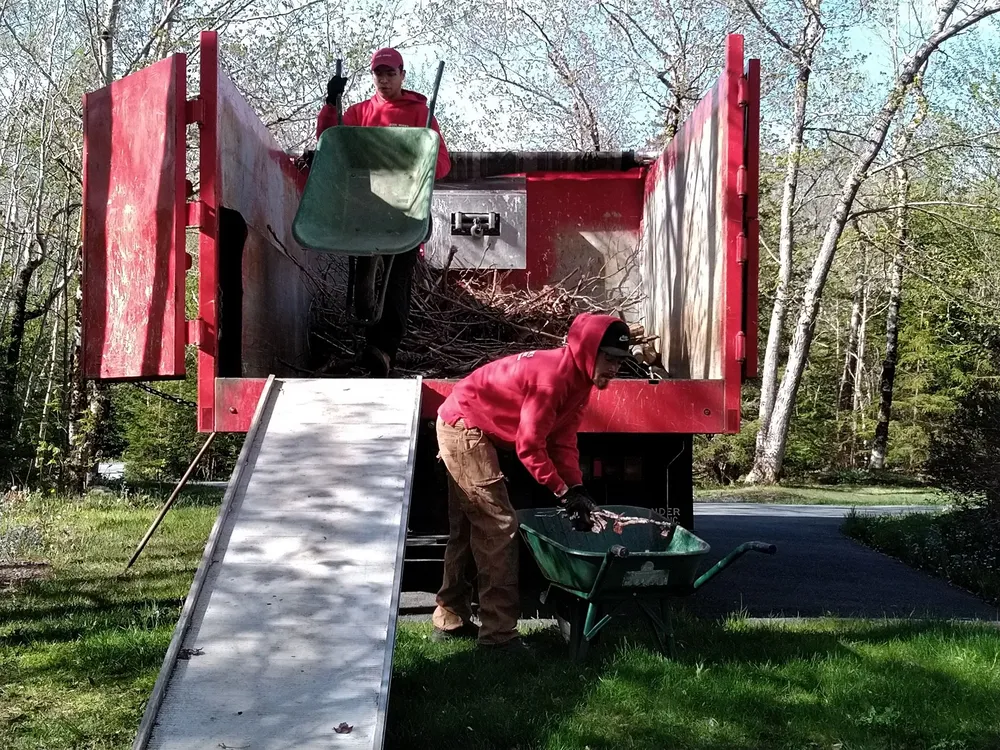 Junk King team removing a hot tub from a Mission District backyard