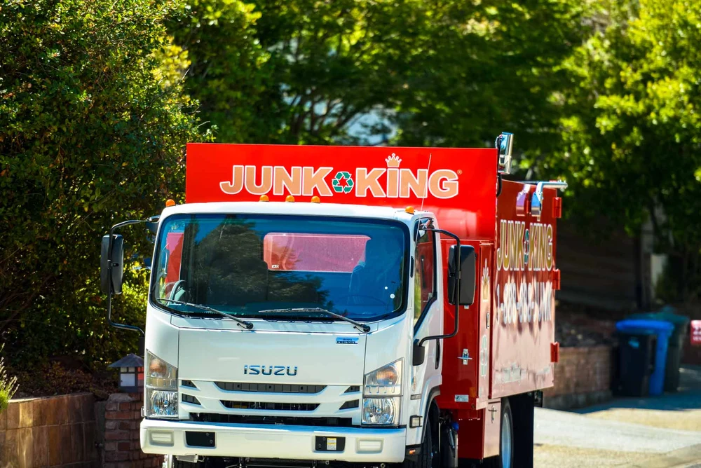 Team from Junk King South San Francisco loading junk in Pacifica neighborhood