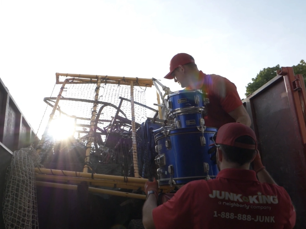 Junk King team loading old appliances in Westborough