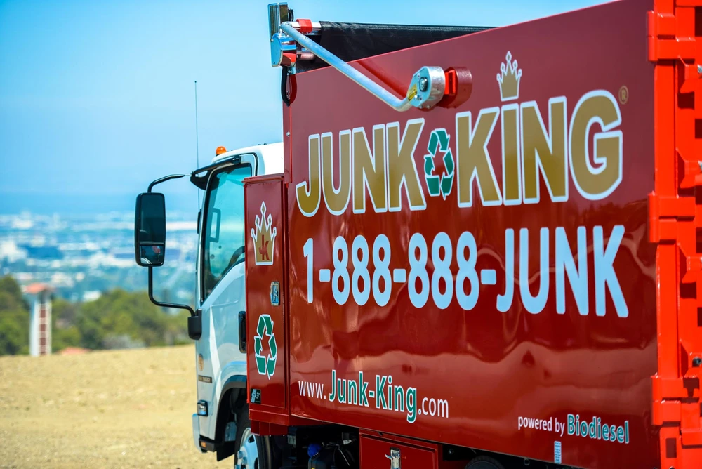Old hot tub removal project completed by Junk King in Pacifica backyard