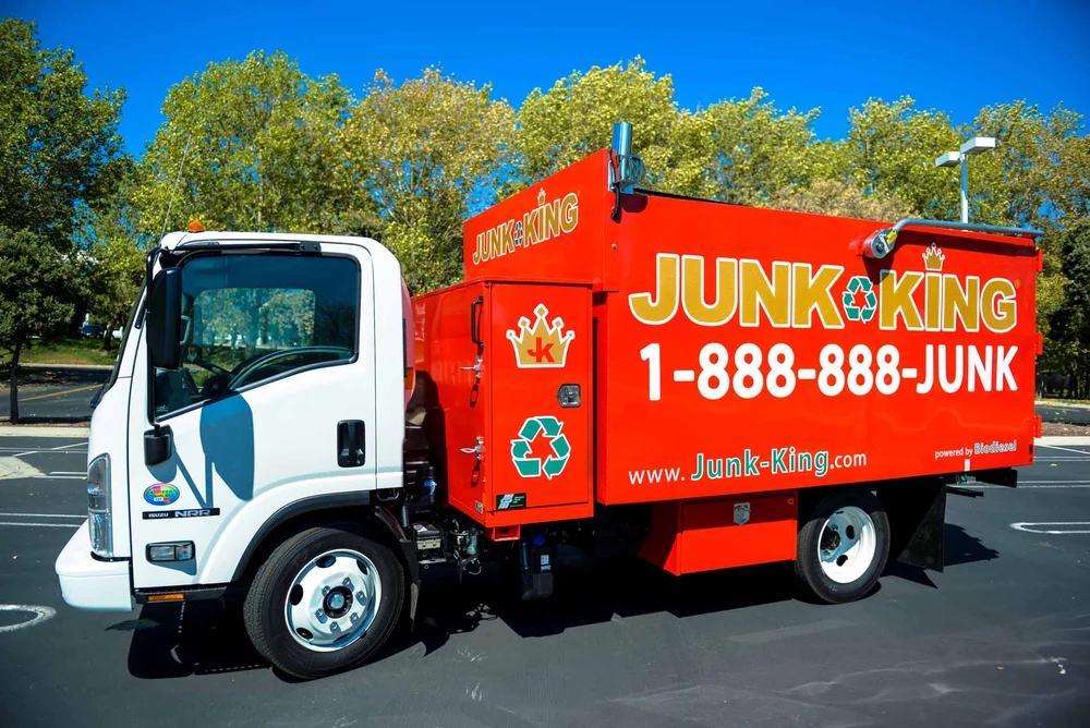Junk King team dismantling and removing an old hot tub in Ashbury Heights