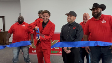 Junk king Reno celebrates Earth day with a ribbon-cutting ceremony at new location.